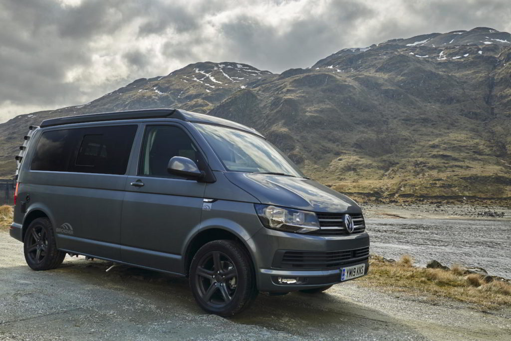 Campervan beside the water